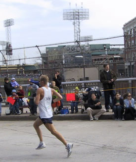 Boston Marathon runner passes Fenway Park